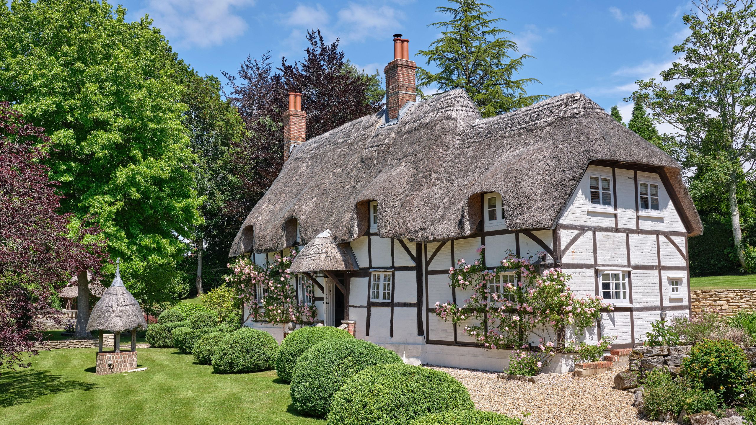 Traditional English cottage with thatched roof